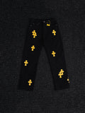 Chrome Hearts Yellow Cross Patch Black Jeans — hero
